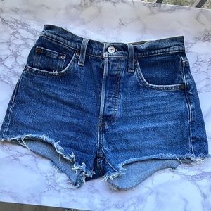Gently used blue 501 Levi cut off shorts